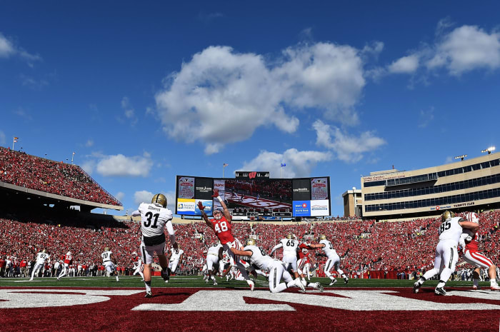 Wisconsin's players try to block a punt against Purdue.