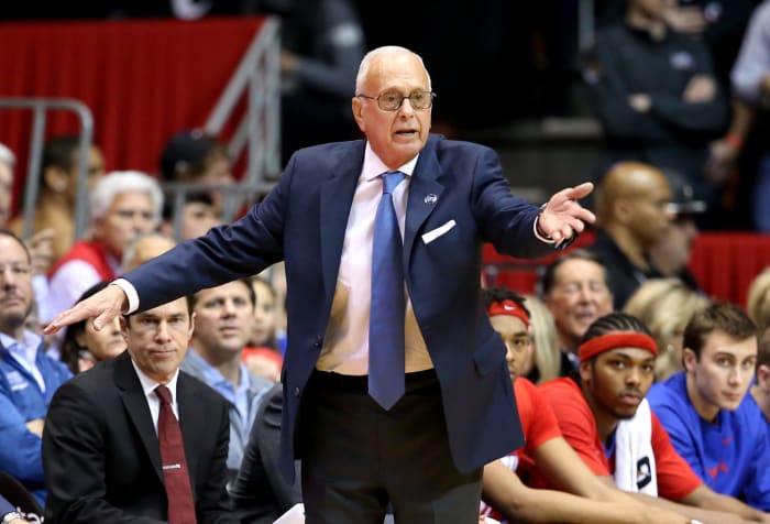 SMU coach Larry Brown reacting to something in the game.