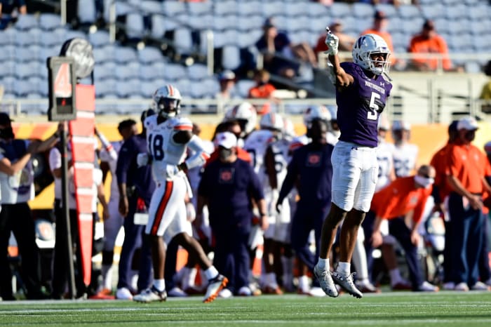 JR Pace celebrates on the field for Northwestern.
