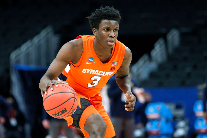 Kadary Richmond #3 of the Syracuse Orange drives with the ball