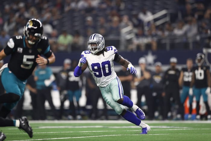 Dallas Cowboys lineman Demarcus Lawrence rushing the passer.