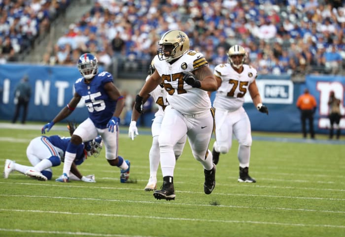 Larry Warford runs down the field.