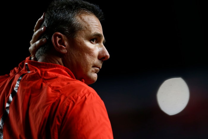 A closeup of Urban Meyer in an Ohio State windbreaker.
