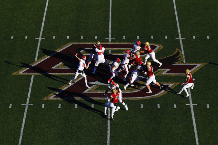 N.C. State's quarterback throwing a pass against Boston College.