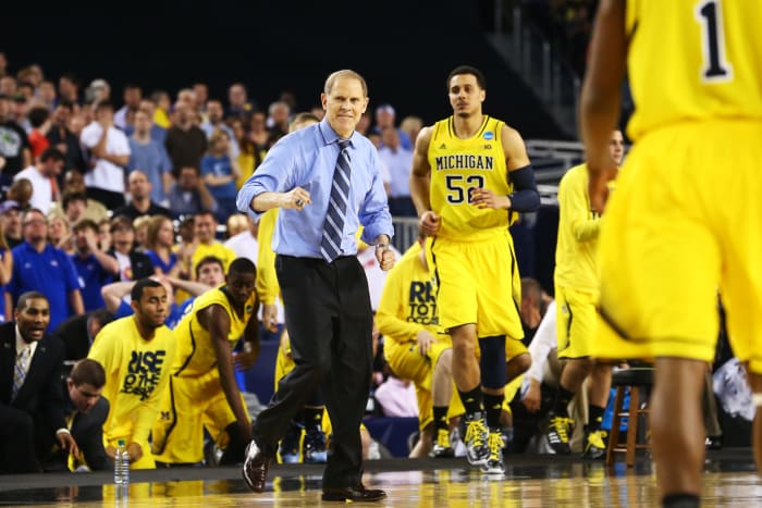 Head coach John Beilein of the Michigan Wolverines celebrates win over Kansas Jayhawks.