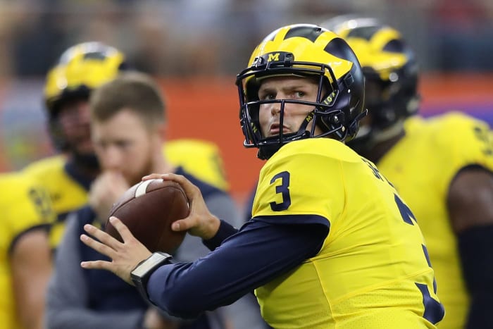Wilton Speight of the Michigan Wolverines warms up before the game against the Florida Gators.