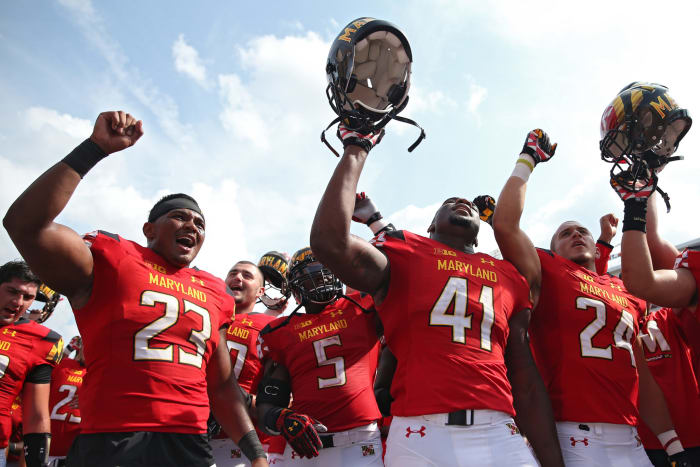 Maryland football players celebrating.