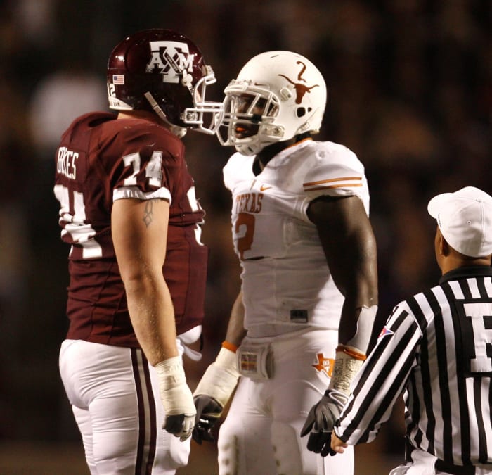 Texas A&M player talking trash to a Texas player.