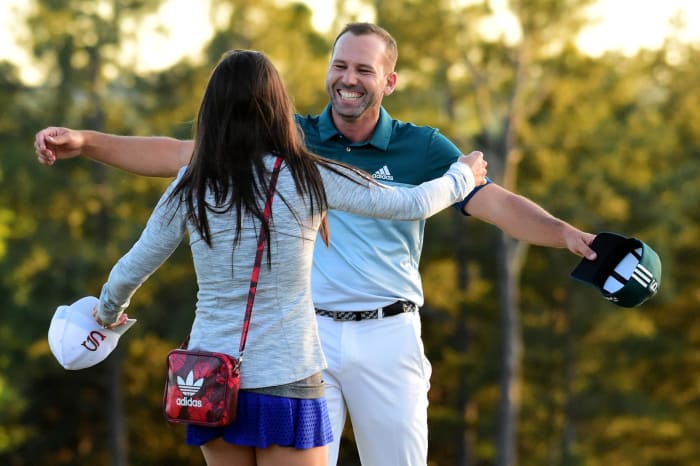 Sergio Garcia hugging his wife.