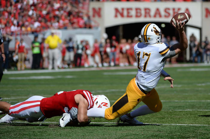 Josh Allen is taken down by a Nebraska linebacker.