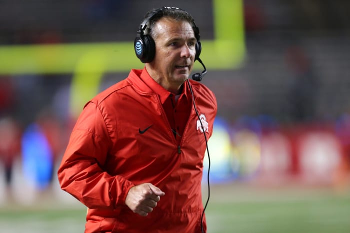 A closeup of Urban Meyer wearing an Ohio State jacket.