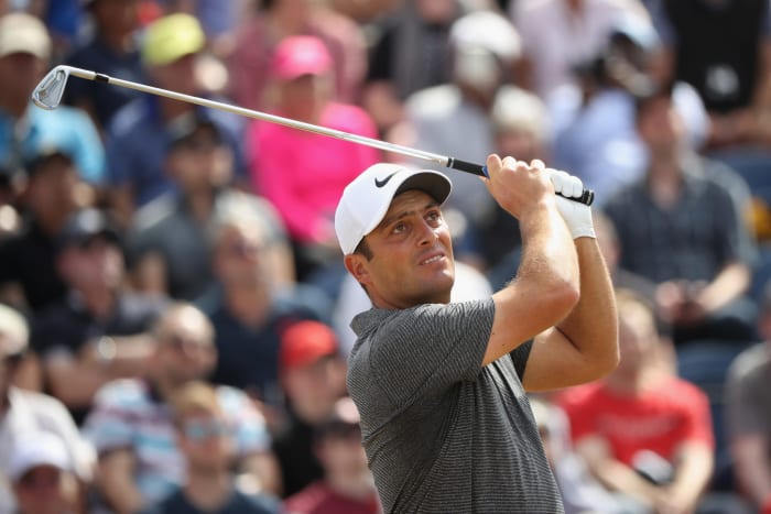 Francesoo Molinari swinging a club at The Open.
