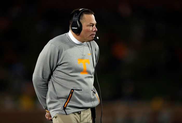 Butch Jones walks the sidelines against Missouri.