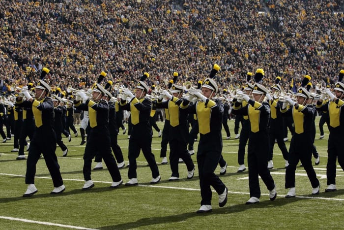 Michigan's band playing on the field.