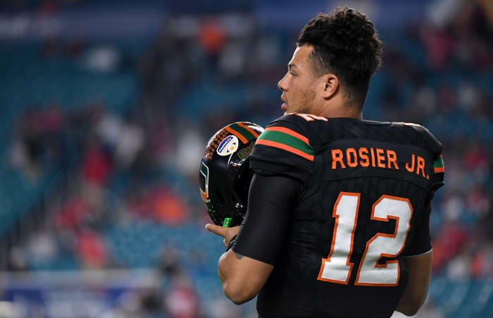 Miami QB Malik Rosier puts on his helmet before the Orange Bowl