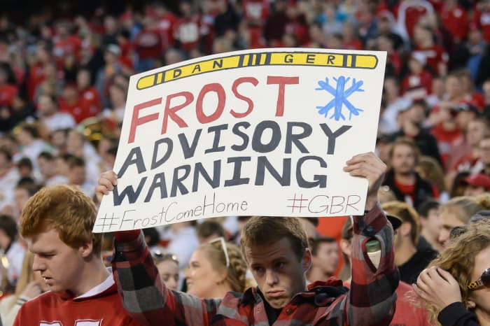 Nebraksa fan holds sign welcoming Scott Frost.
