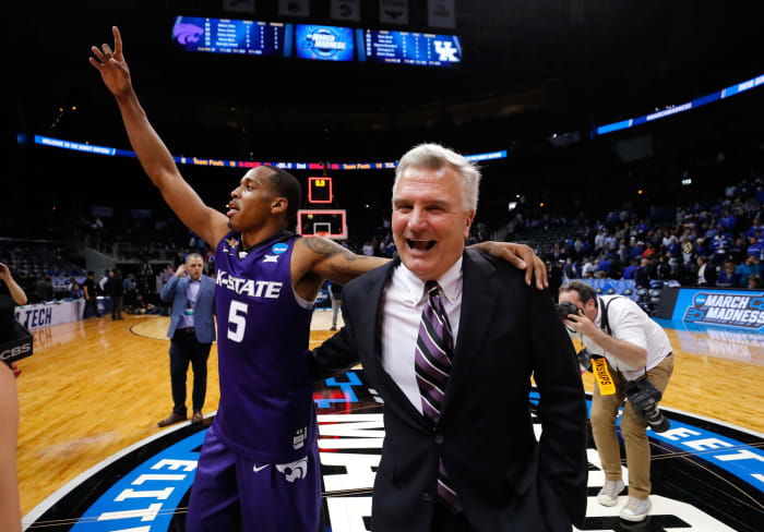 Bruce Weber celebrates with Barry Brown.