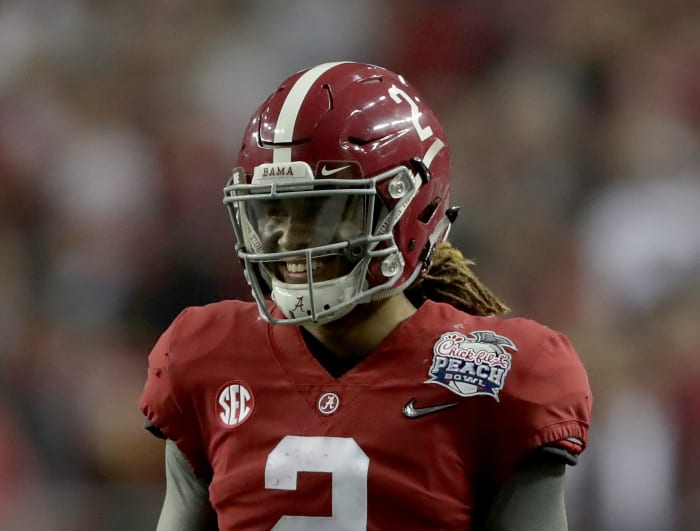 Jalen Hurts of the Alabama Crimson Tide reacts after a touchdown against the Washington Huskies.