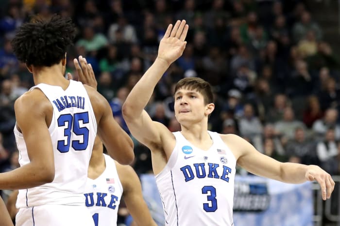 Grayson Allen celebrates with Marvin Bagley.