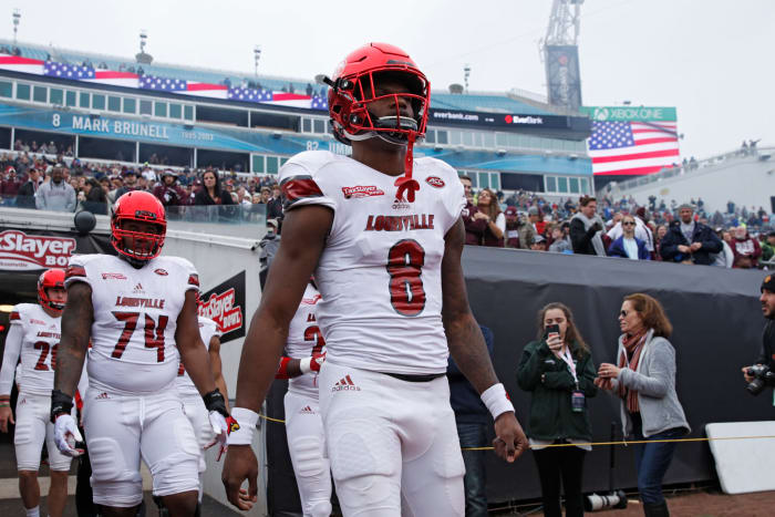 Lamar Jackson takes the field before a game.