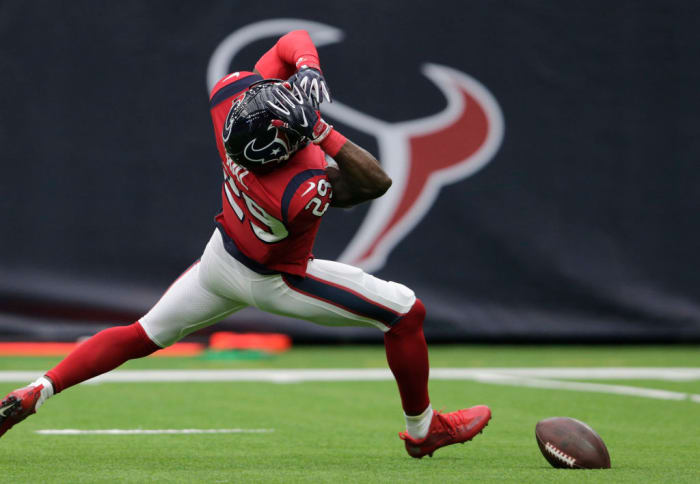 A Houston Texans player drops a pass.