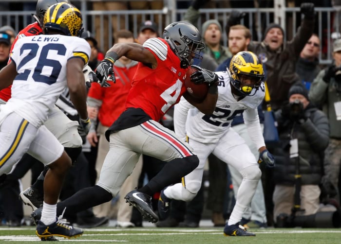 Curtis Samuel running for a touchdown against Michigam.