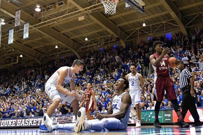 Wendell Carter and Grayson Allen celebrate.
