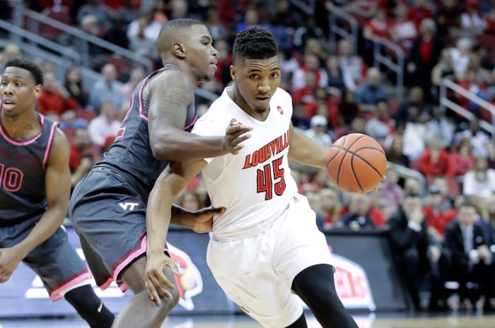 Donovan Mitchell drives past a defender while playing for Louisville.