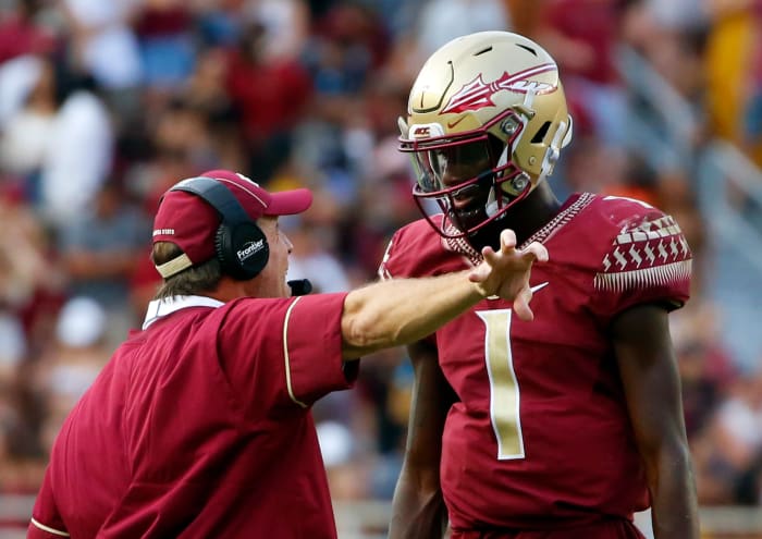 Jimbo Fisher talking to James Blackman during a Florida State football game.
