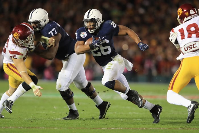 Saquon Barkley running with the ball.