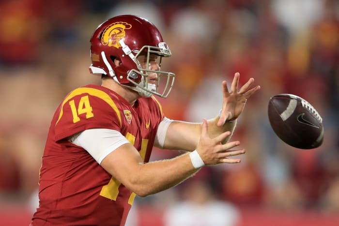 Sam Darnold taking a snap.