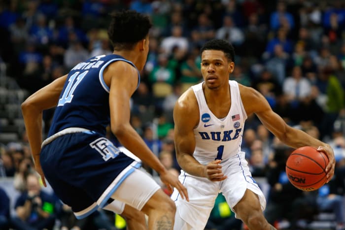 Trevon Duvall takes on a Rhode Island defender.