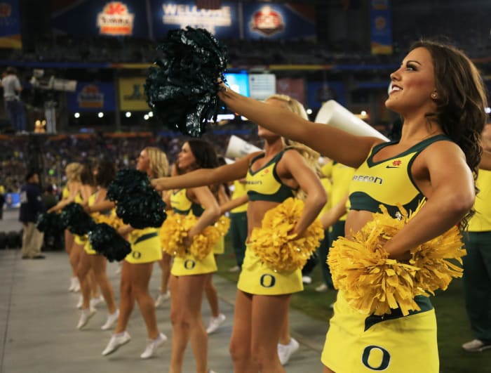 Oregon cheerleaders performing during a game.