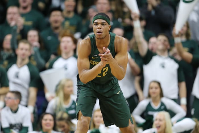 A closeup of Miles Bridges in a green Michigan State uniform.