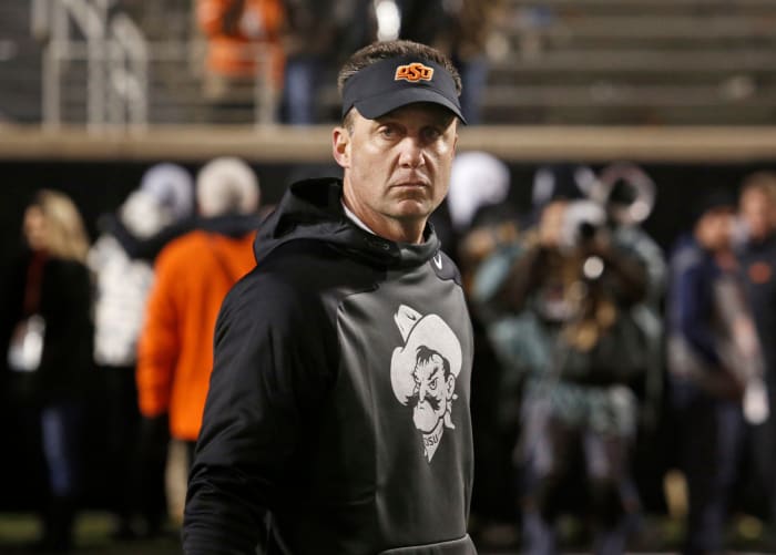 Mike Gundy prepares to coach his team in the Bedlam Game.