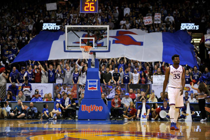 Udoka Azubuike walking on the court during a Kansas basketball game.
