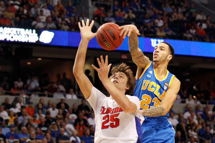 A college basketball game between UCLA and Florida.