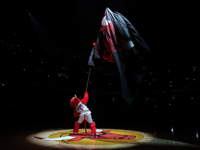 Benny the Bull waving the Chicago Bulls flag.