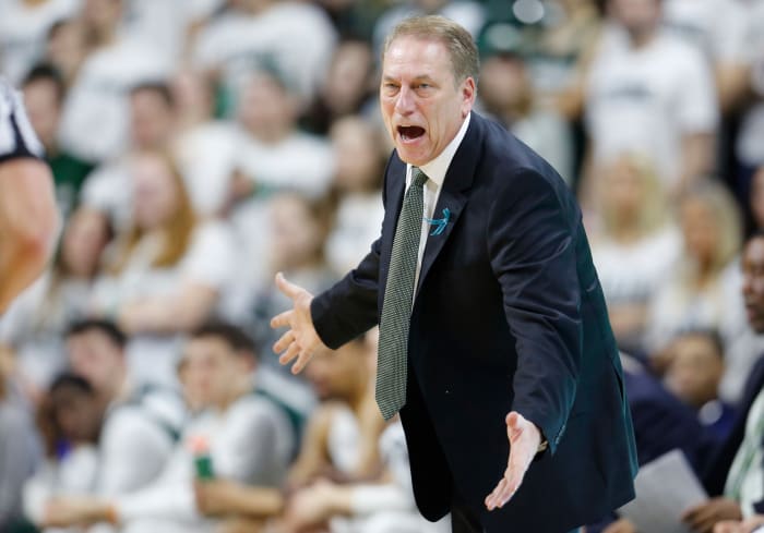 Tom Izzo reacting to a call during a Michigan State basketball game.