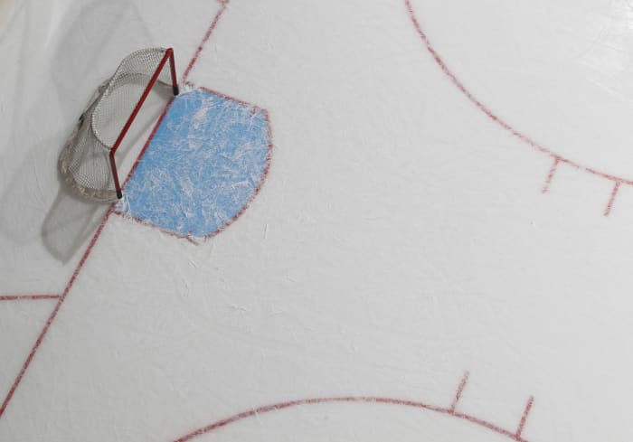 A view of a hockey net from above.