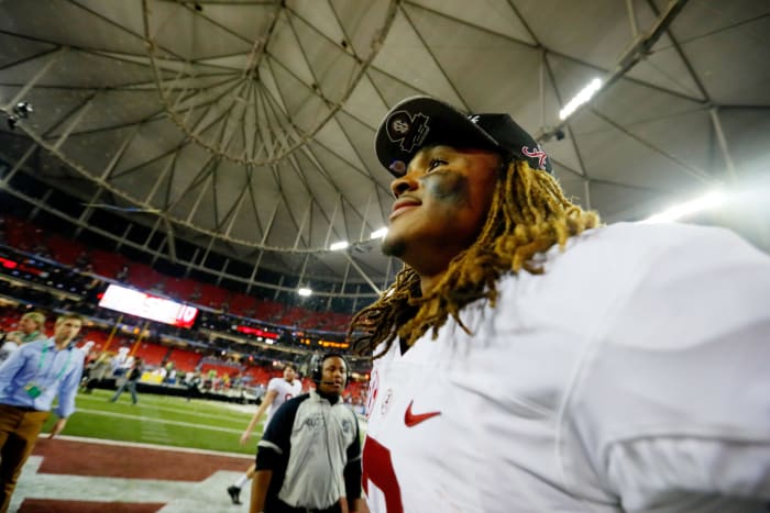 Jalen Hurts of the Alabama Crimson Tide celebrates their 54 to 16 win over the Florida Gators in the SEC Championship game.