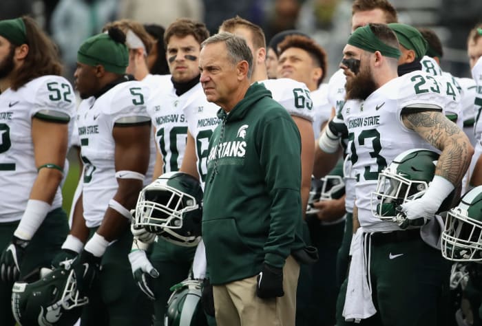 Mark Dantonio standing on the Michigan State sideline.