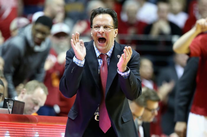 A closeup of Tom Crean clapping.