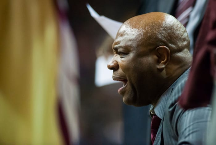 A closeup of Leonard Hamilton in the Florida State huddle.