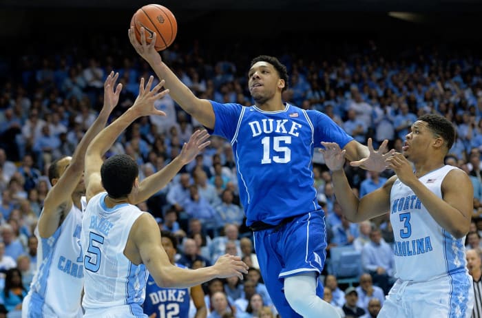 Jahlil Okafor drives the ball against North Carolina defenders.