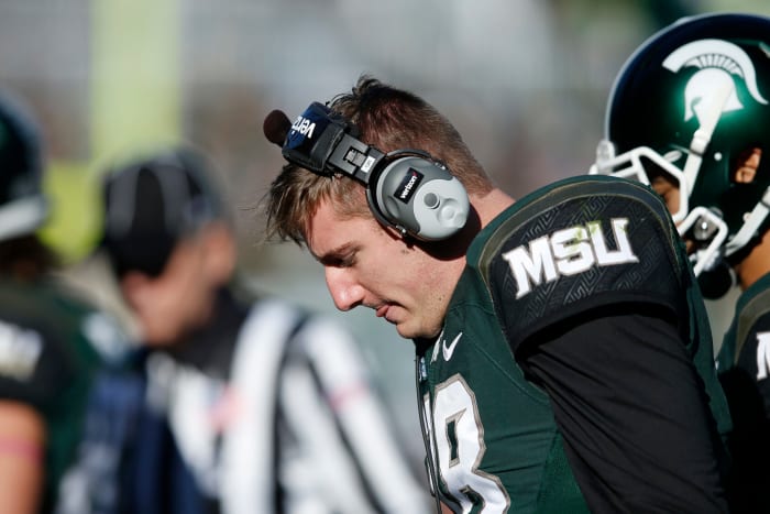 A closeup of Connor Cook on the Michigan State sideline.
