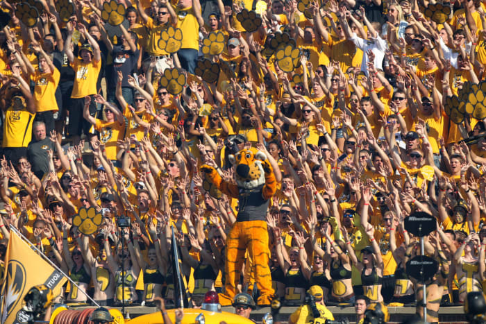 Missouri's football mascot cheering with the fans.