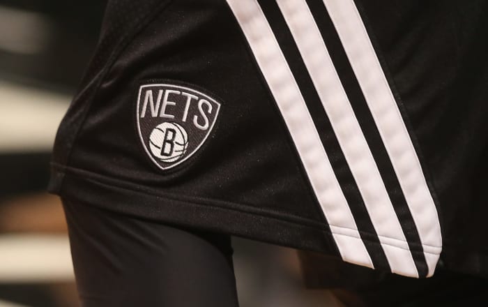 A closeup of Brooklyn Nets shorts.