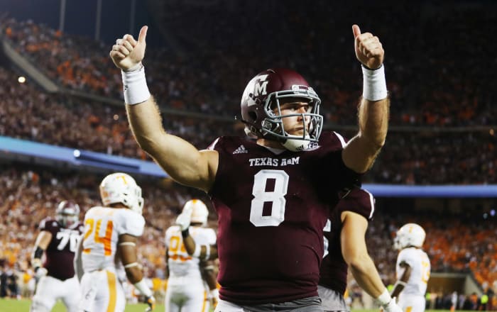 Trevor Knight giving two thumbs up in a Texas A&M uniform.