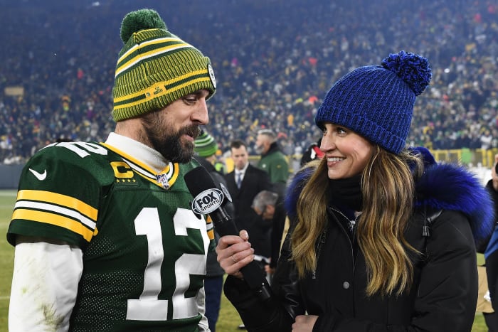 GREEN BAY, WISCONSIN - JANUARY 12: Aaron Rodgers #12 of the Green Bay Packers speaks with Erin Andrews following a victory over the Seattle Seahawks in the NFC Divisional Playoff game at Lambeau Field on January 12, 2020 in Green Bay, Wisconsin. (Photo by Stacy Revere/Getty Images)